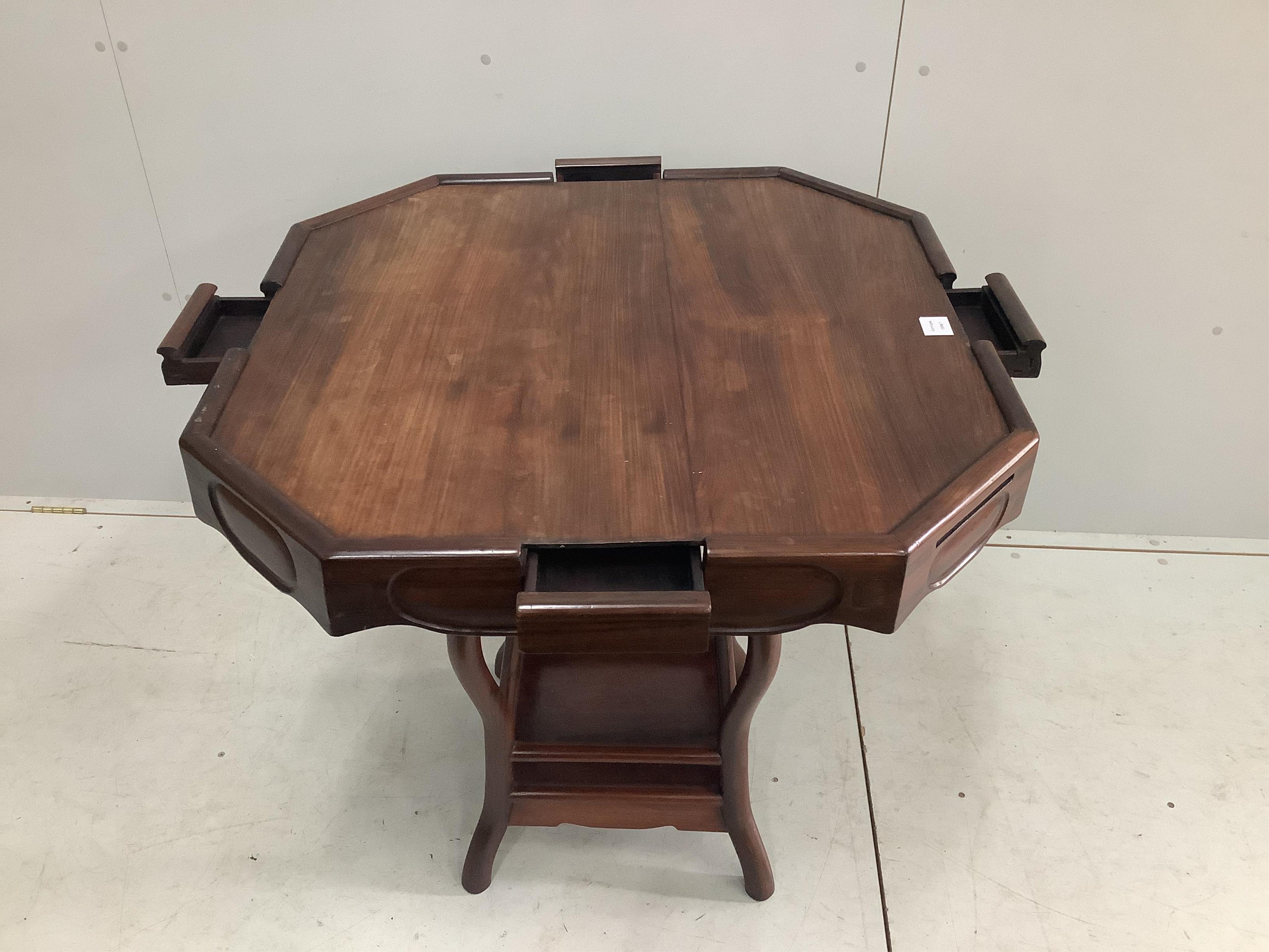 A Chinese octagonal padouk wood mah jong table, width 85cm, depth 84cm, height 82cm. Condition - fair